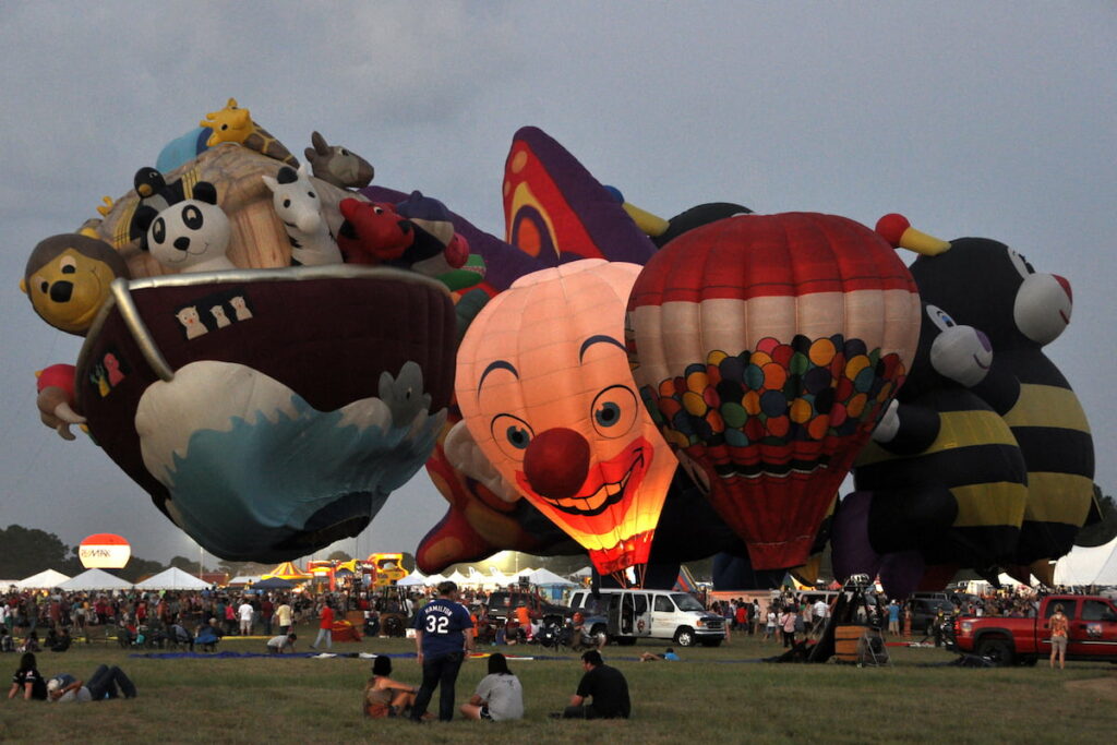 Unique hot air balloon designs lighting up the night sky with balloon glow